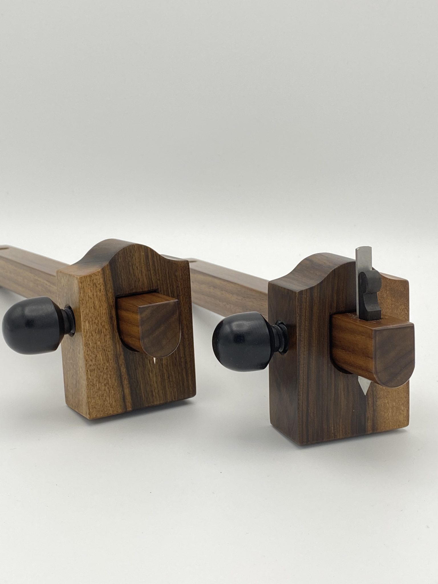 A matched pair of marking and cutting gauges in English walnut